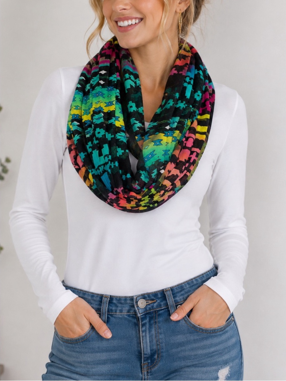 Colorful multicolor infinity scarf featuring a bold abstract/geometric pattern